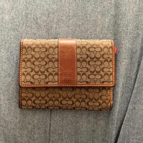 Coach Handbags - Vintage coach wallet with red interior